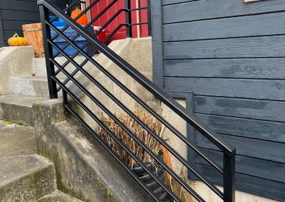 Horizontal porch rail by Kervin Ironworks for a Portland porch