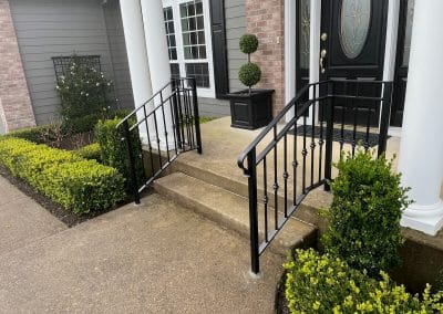Iron matched porch rails by Kervin's Ironworks